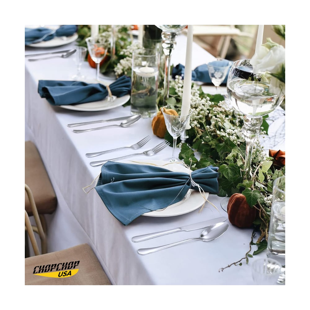 Dinner table set with ChopChop USA silverware and blue napkins