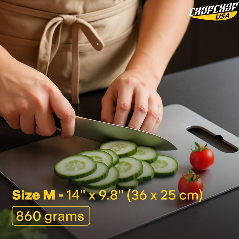 Knife slicing cucumber on the Medium titanium board