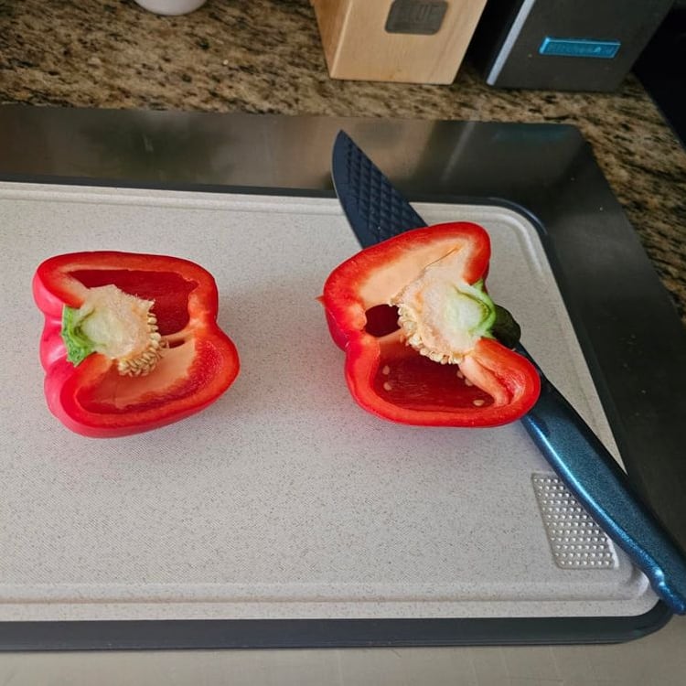 Red pepper cut on the double-sided board