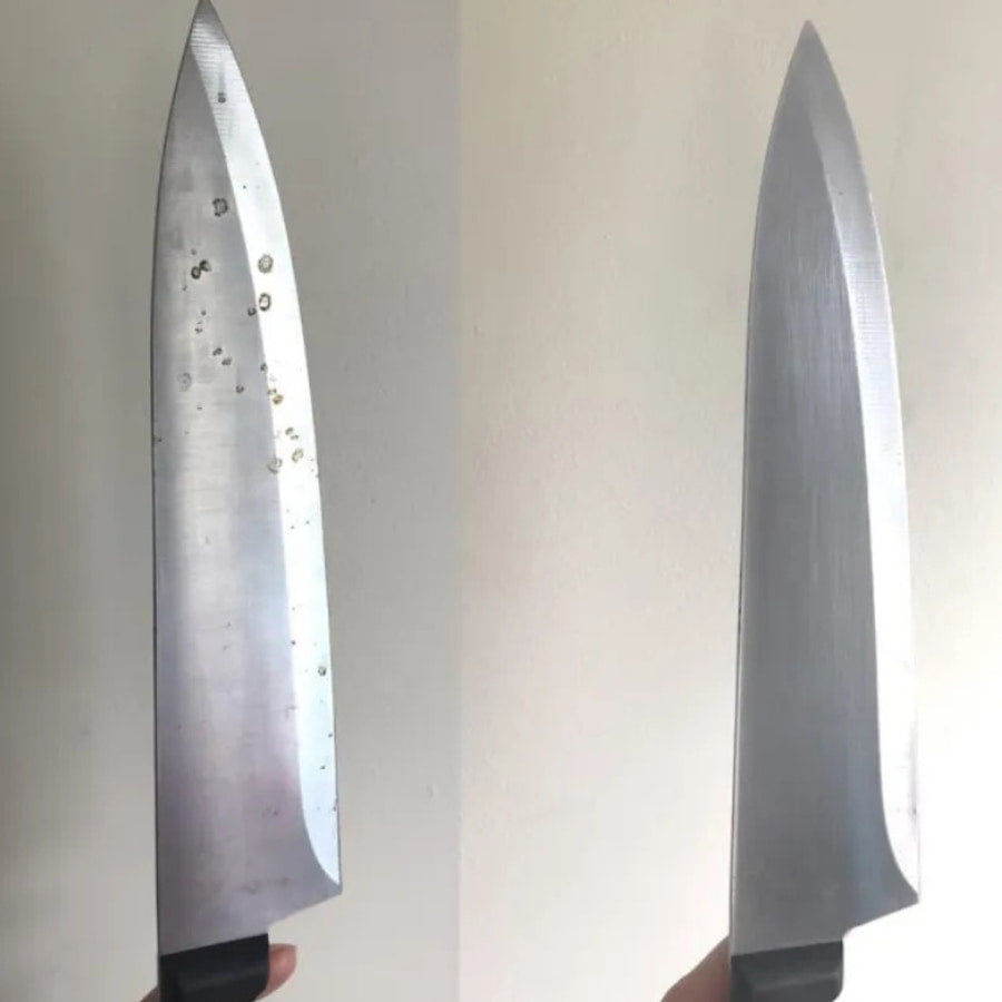 Cheap kitchen knives with rust spots and pitting on the blade