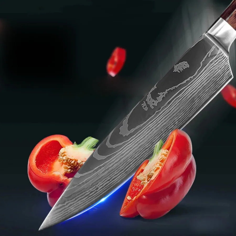 The Kiritsuke K-tip slicing cleanly through a red pepper