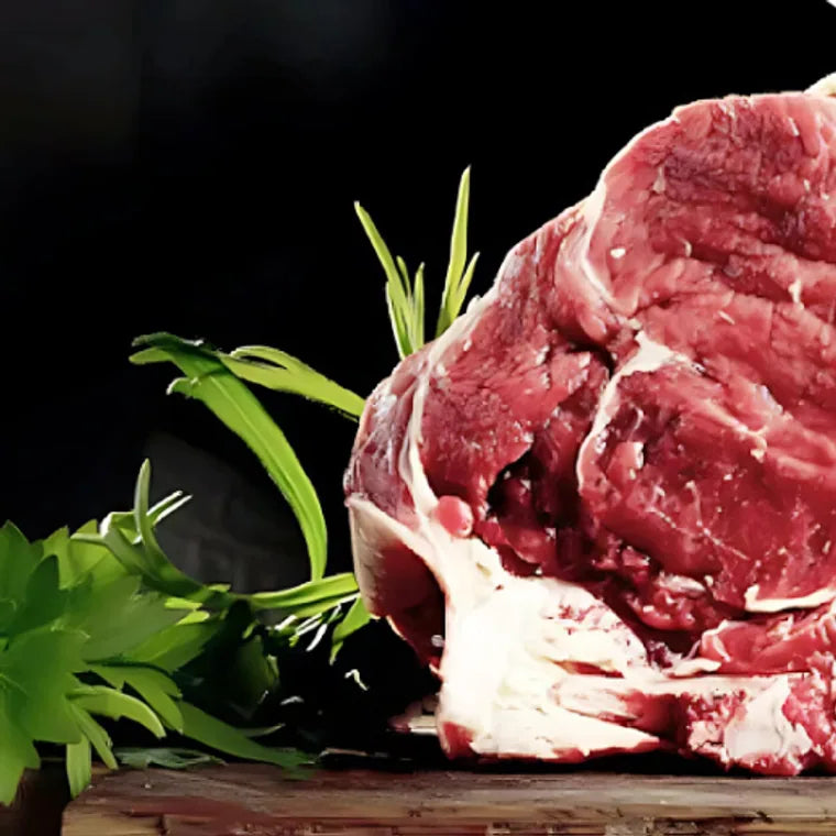 Raw ribeye steak, the kind of cut a dull knife crushes and tears