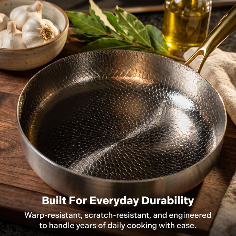 Titanium deep pan with garlic and oil, built for everyday durability
