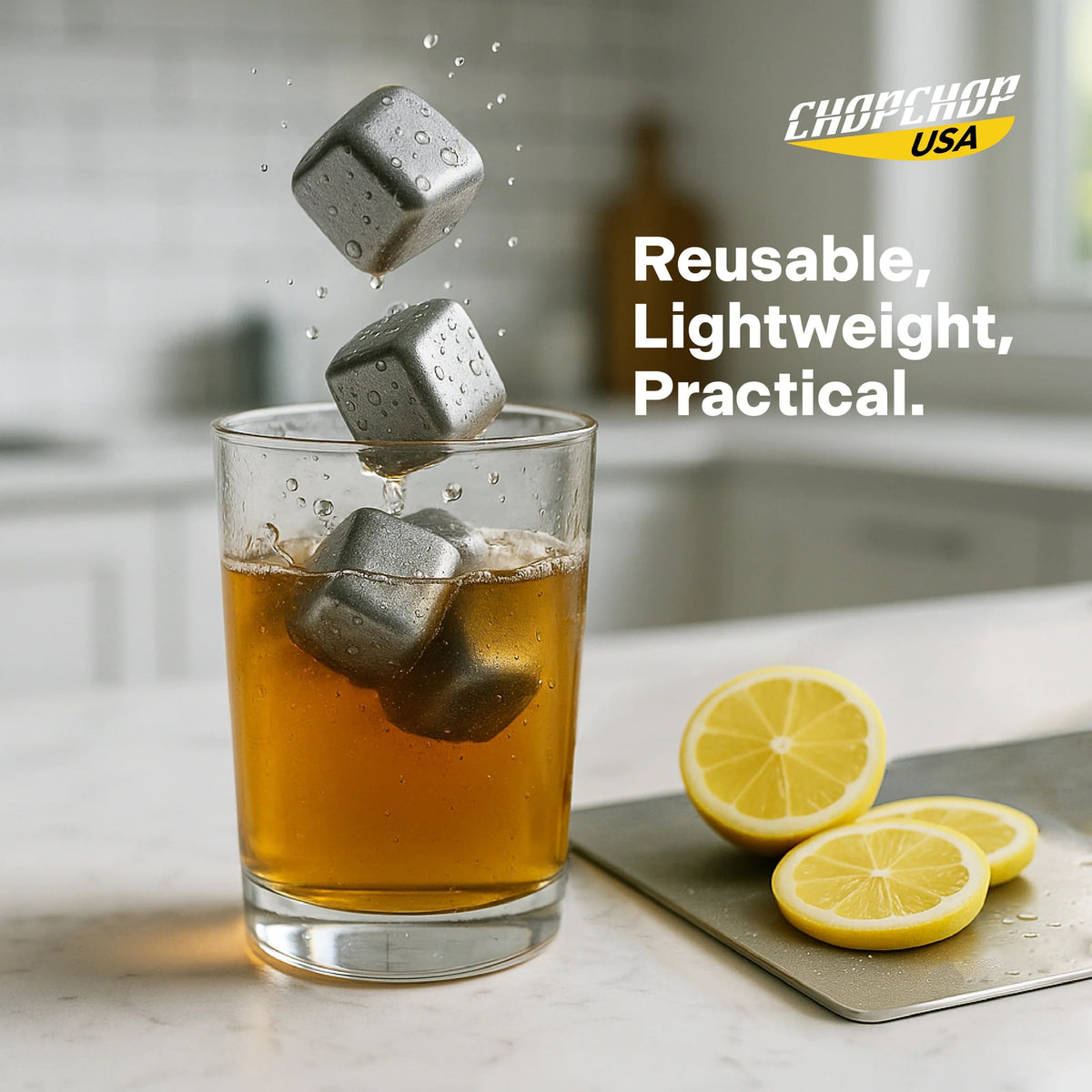 Titanium ice cubes dropping into a glass of iced tea with lemon