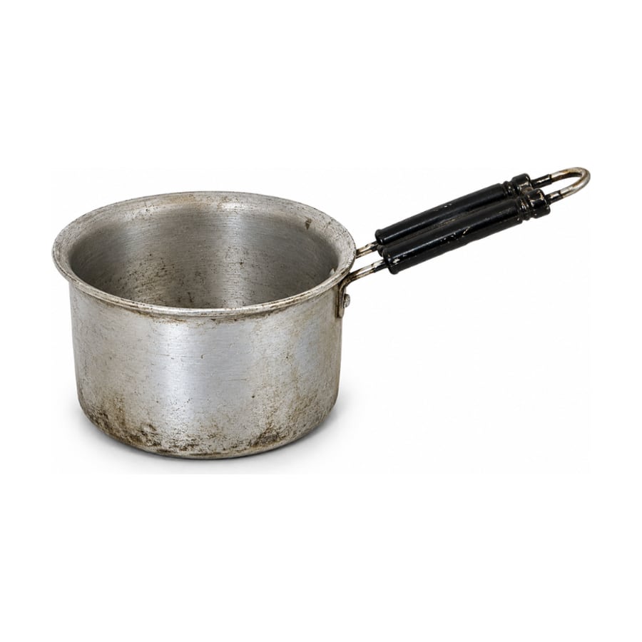 Old dented aluminum saucepan